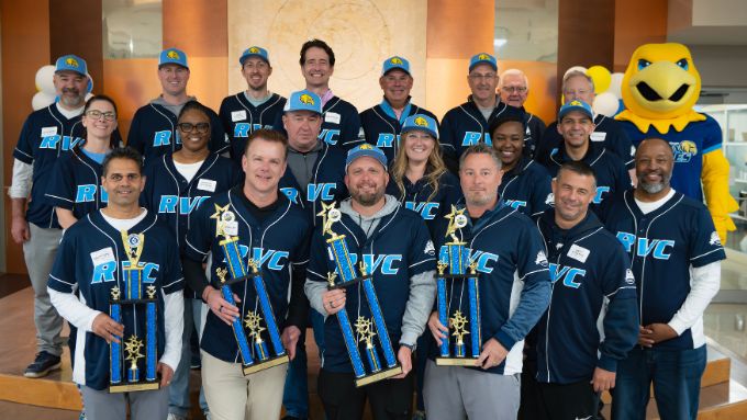 CEO Challenge winners pose with their trophies and RVC mascot Arvee