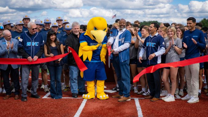 Field turf ribbon cutting ceremony with Arvee