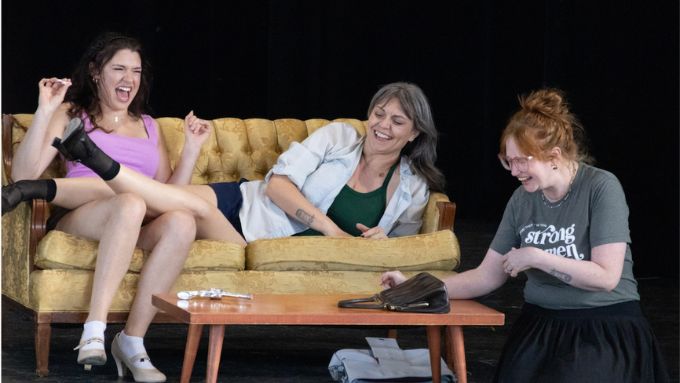 Three Starlight cast members rehearsing for 9 to 5